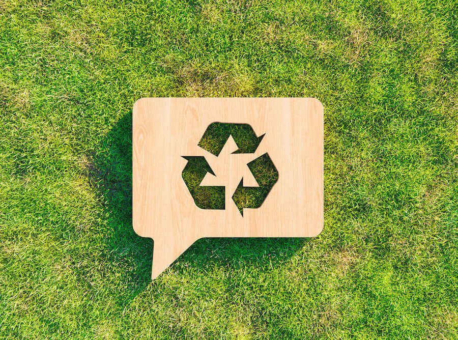 Sustainability recycling symbol on grass